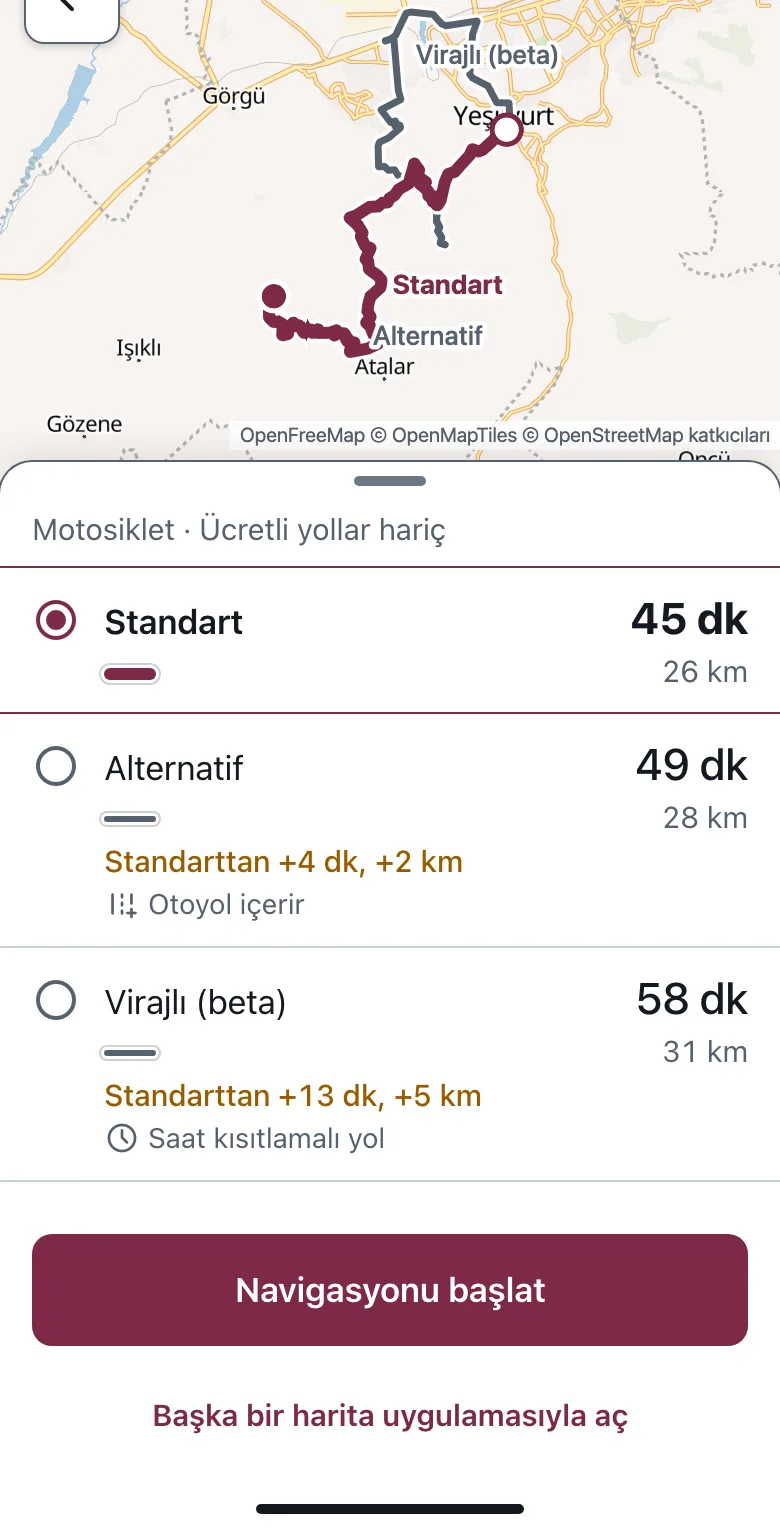 Rota karşılaştırma ekranı: Standart 45 dakika 26 km, Alternatif 49 dakika 28 km, Virajlı (beta) 58 dakika 31 km ve Navigasyonu başlat düğmesi.